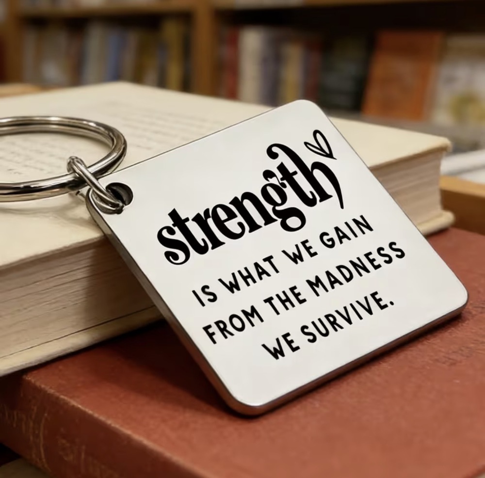 3/$25 Strength Is What We Gain From The Madness We Survive Stainless Keychain